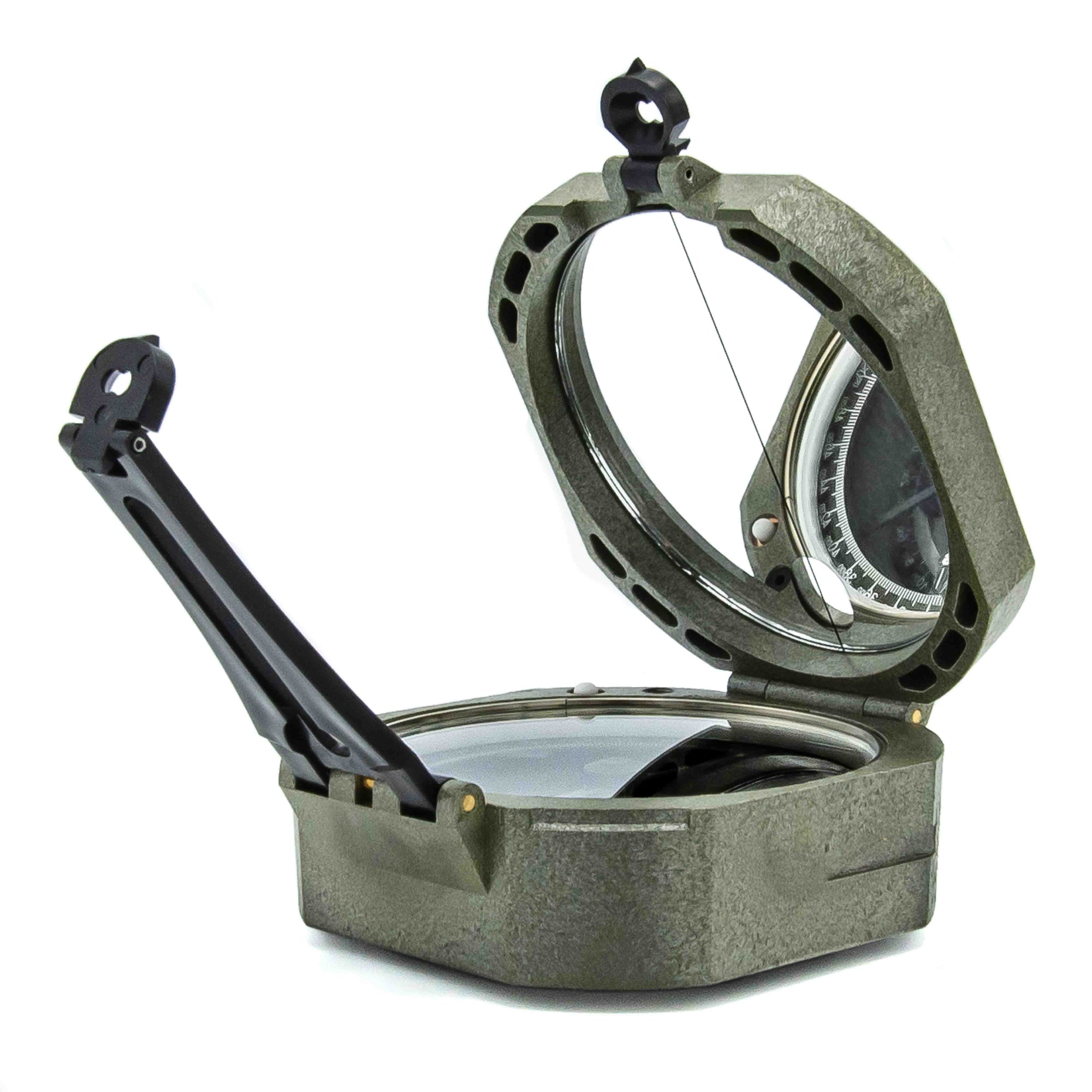 Green compass with open lid on a white background