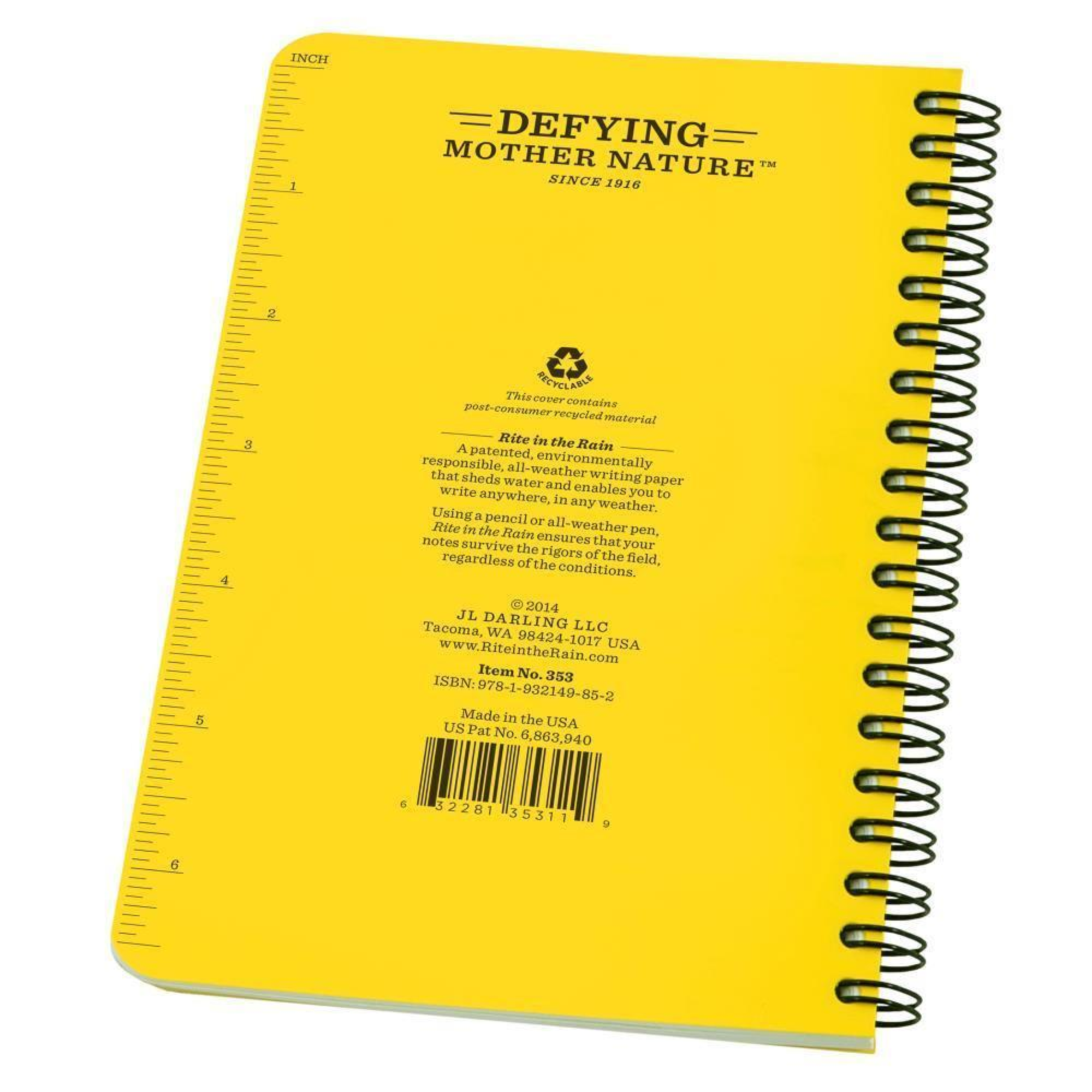 Back of a yellow side spiral notebook with a measurement scale on the side of the book.