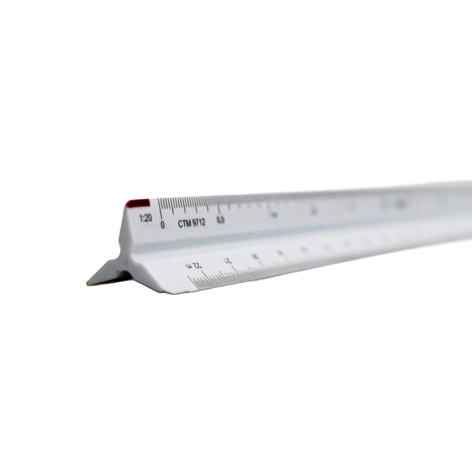 A white plastic ruler with black measurement markings
