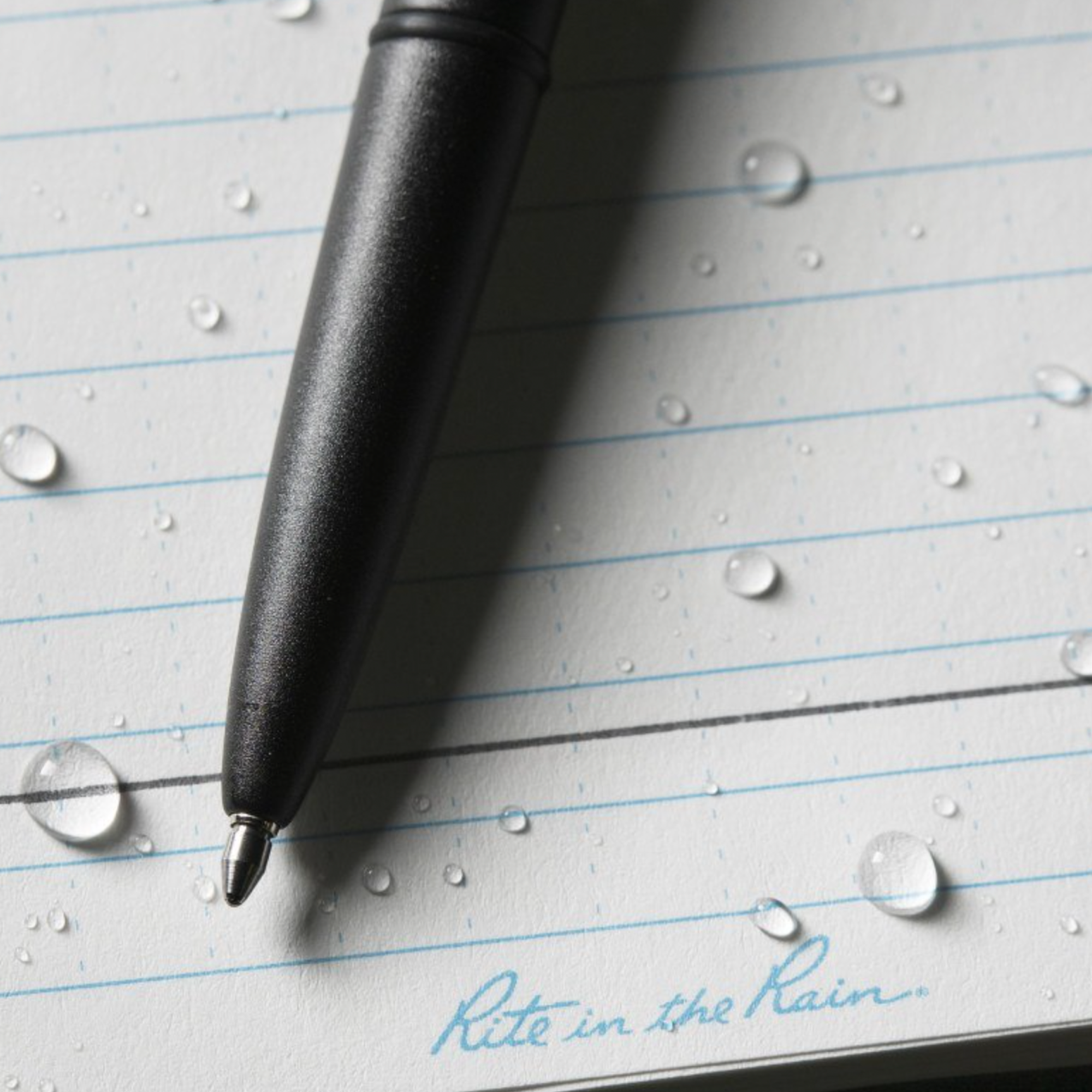 Black pen on lined paper with 'Rite in the Rain' text